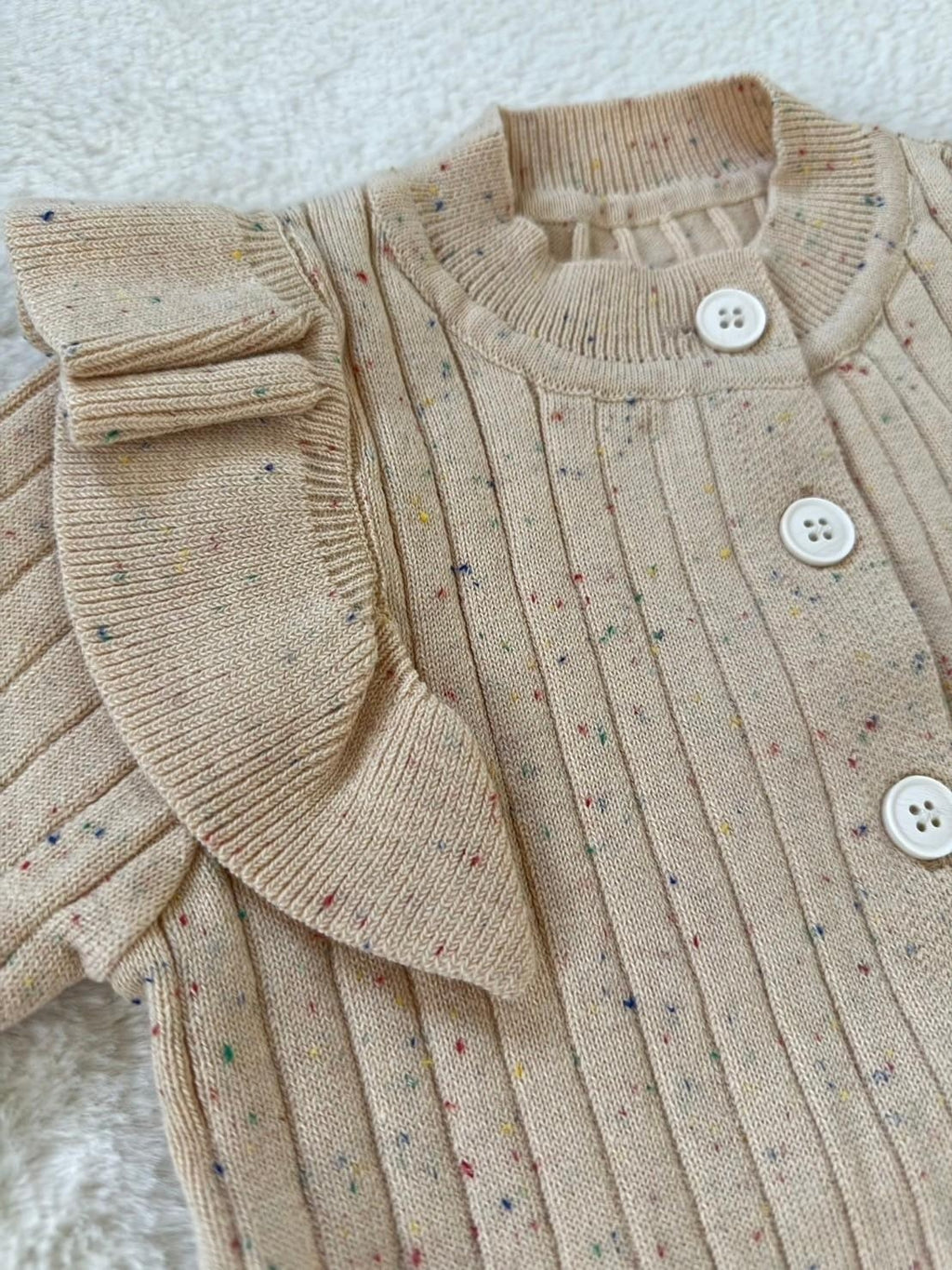 フリルニットロンパース（前開きタイプ）