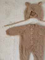 くま耳帽子付きふわふわロンパース